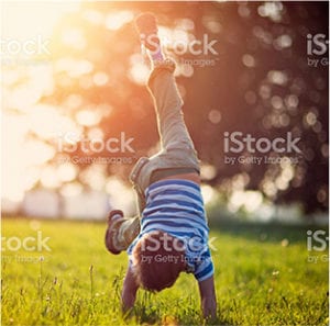 Boy playing in the gorund