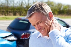 Man suffering with neck pain