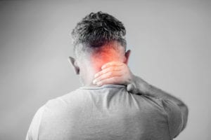 Man having pain in his neck