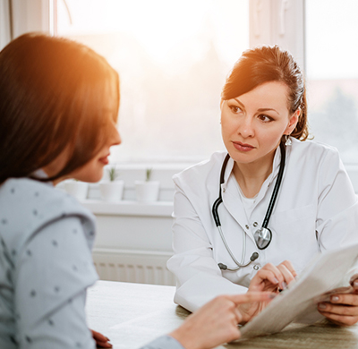 Doctor and patient discussing report