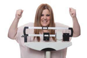 woman Celebrating weight loss