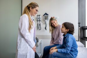 Young patient talking to a family medicine doctor