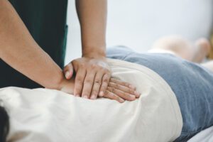 Chiropractor helps to heal a young woman's back