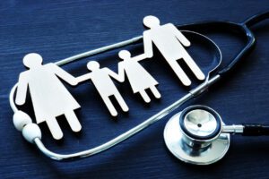 Family practices. Figures and stethoscope. Family Medicine Clinic.